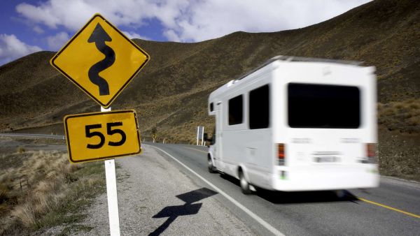 Campervan Tips and Tricks - Motorhome Driving Carefully on Curved Road